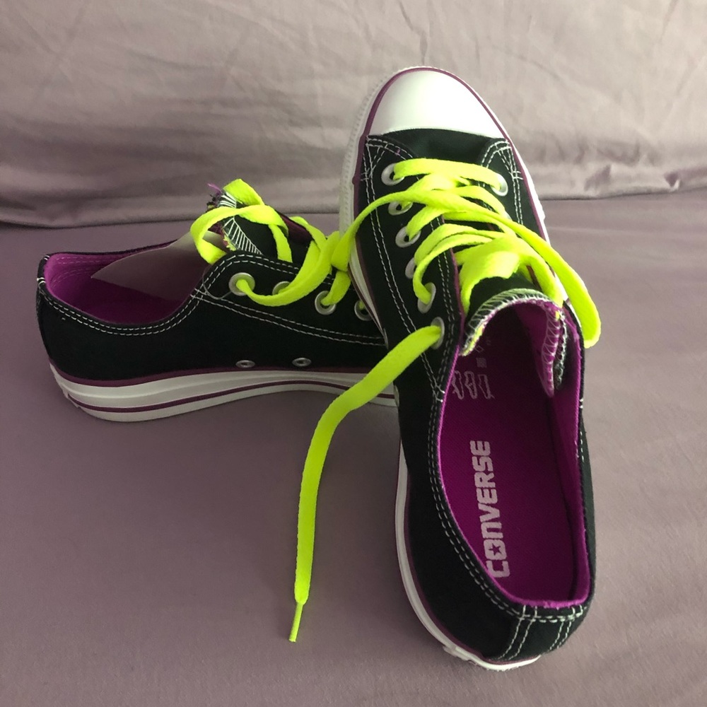 Black, purple inside Converse w/neon laces.